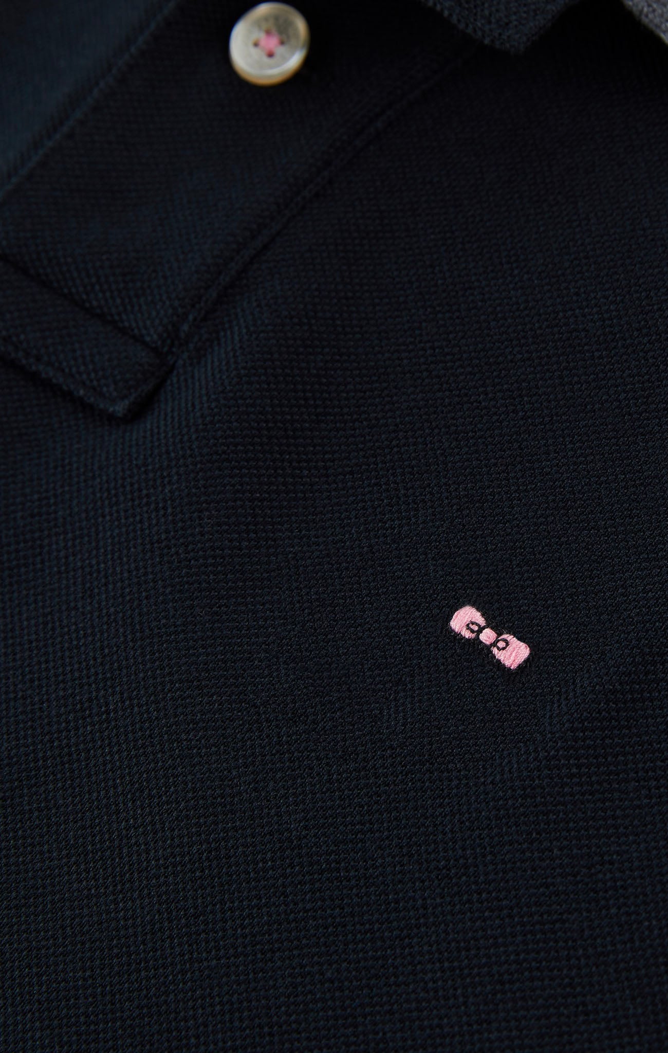 Black cotton polo with contrasting neck