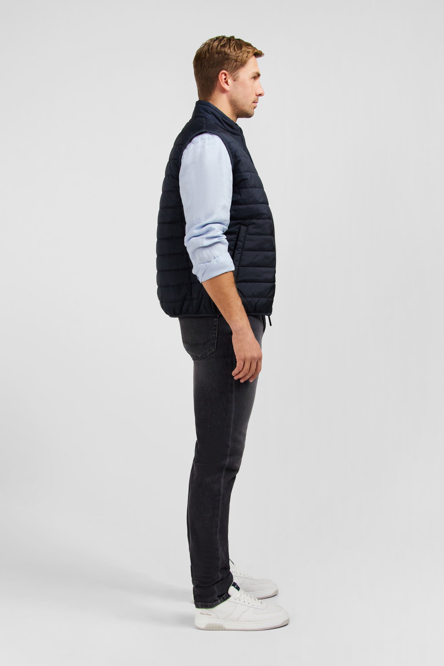 Navy blue sleeveless puffa jacket