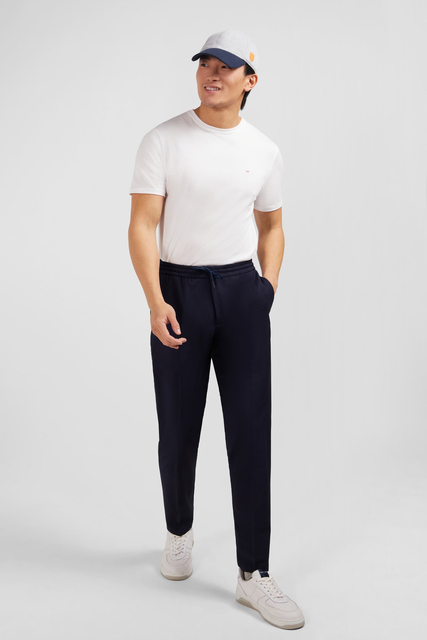 Navy blue trousers with elasticated waist