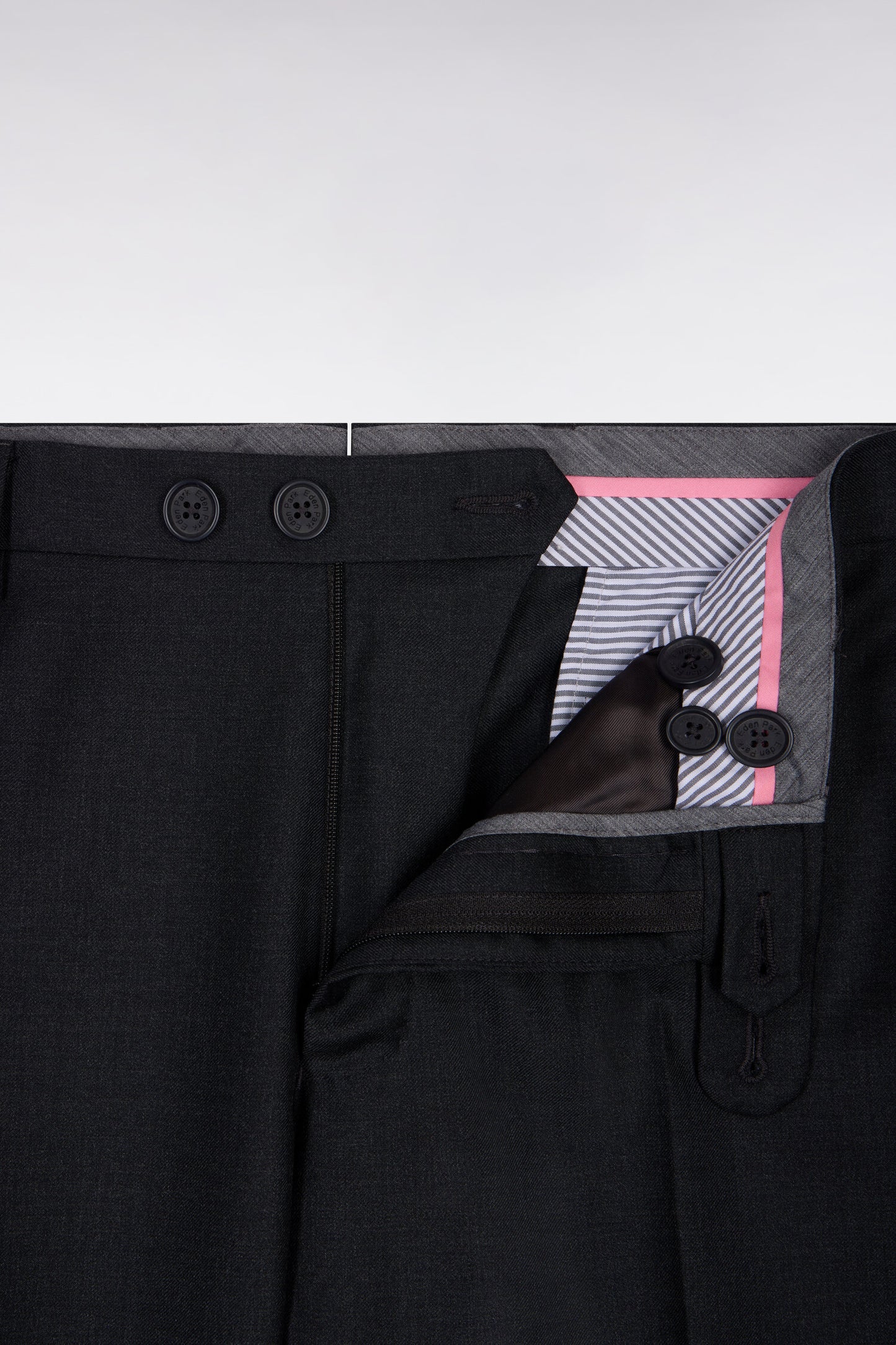 Slim dark grey wool trousers with broken fold