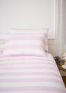 Set of rectangular pillowcases in white cotton with pink stripes