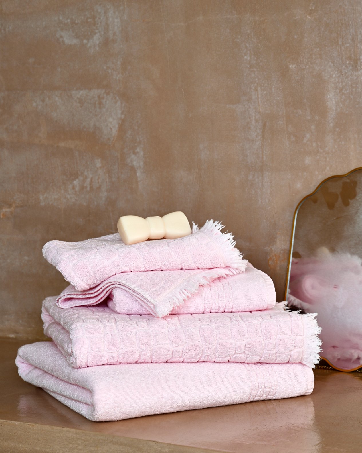 Pink cotton hand towel with micro bowknot patterns