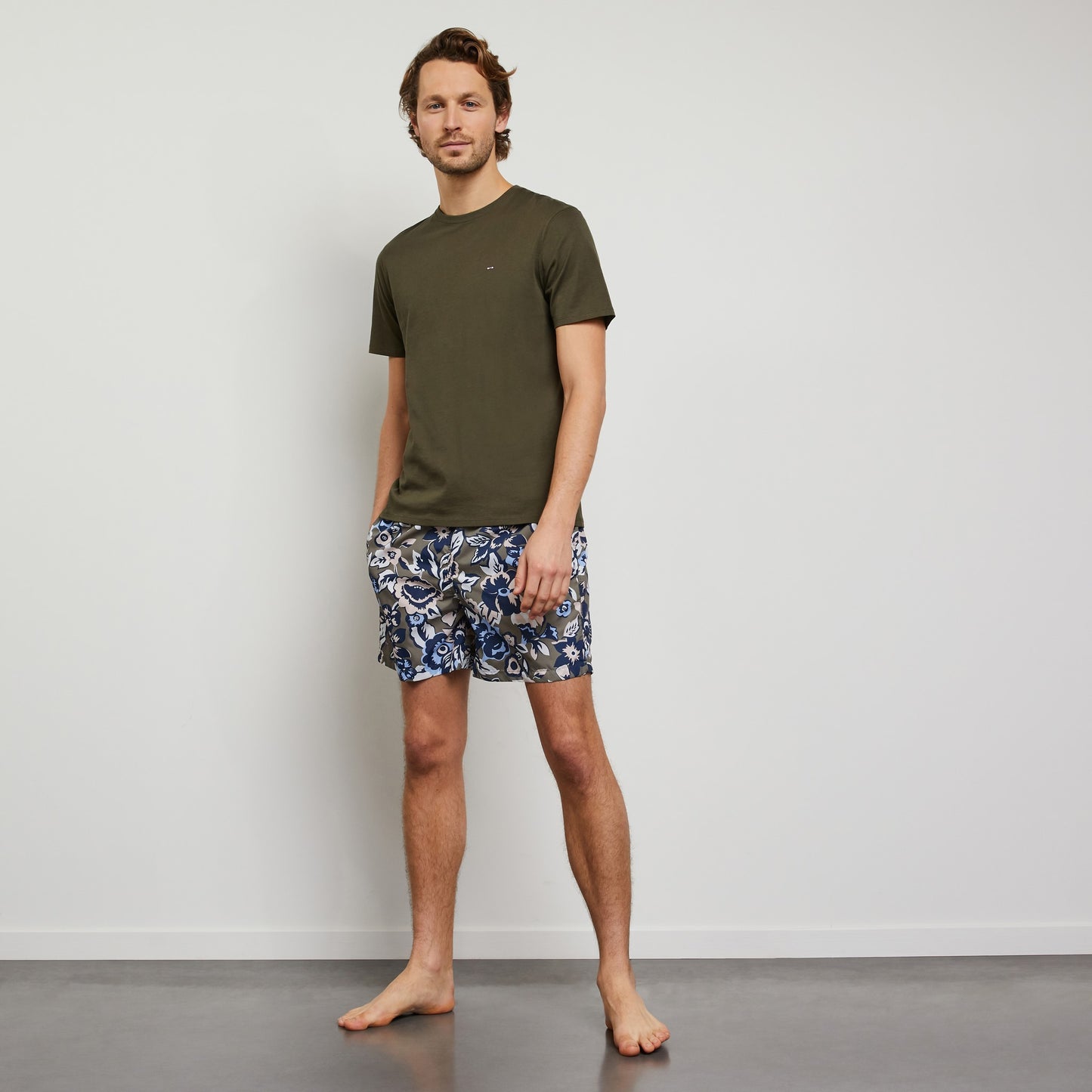 White swim shorts with exclusive floral print