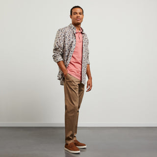Beige trousers with loose pleats
