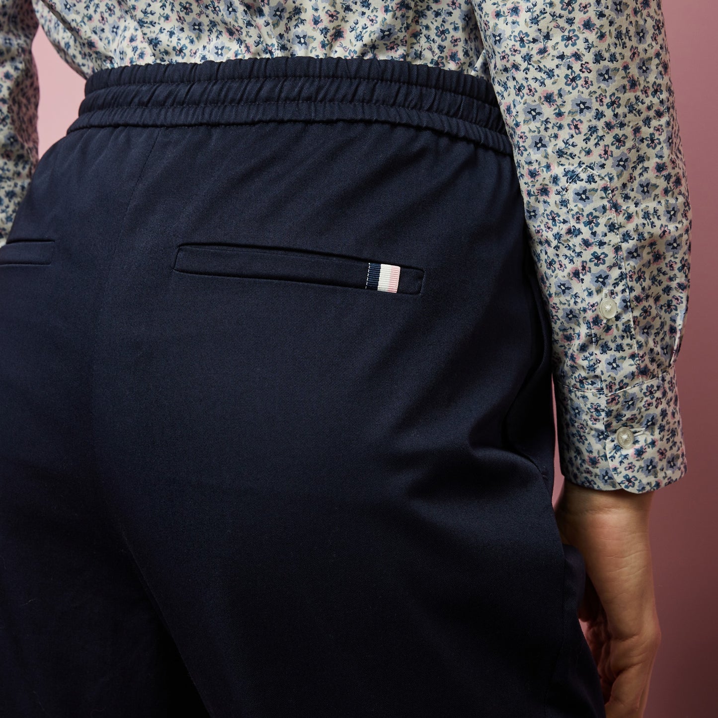 Dark blue trousers with elasticated waist