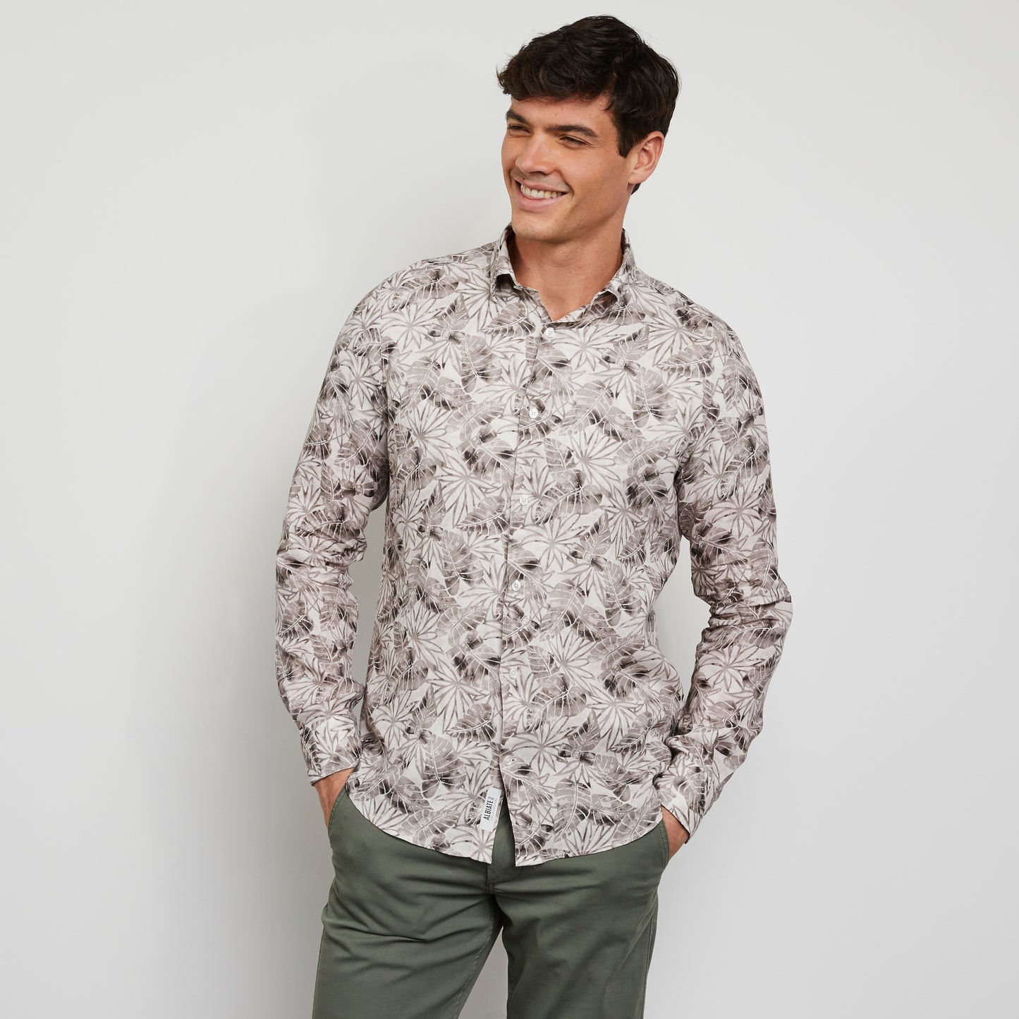 Beige linen shirt with a leaves print