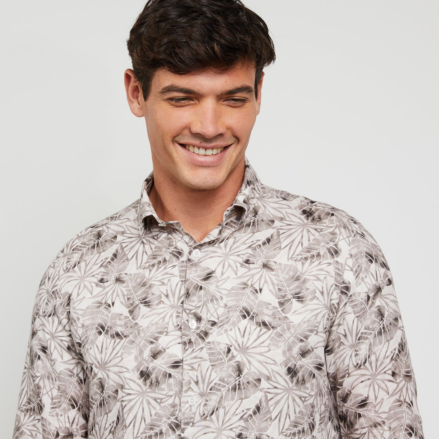 Beige linen shirt with a leaves print