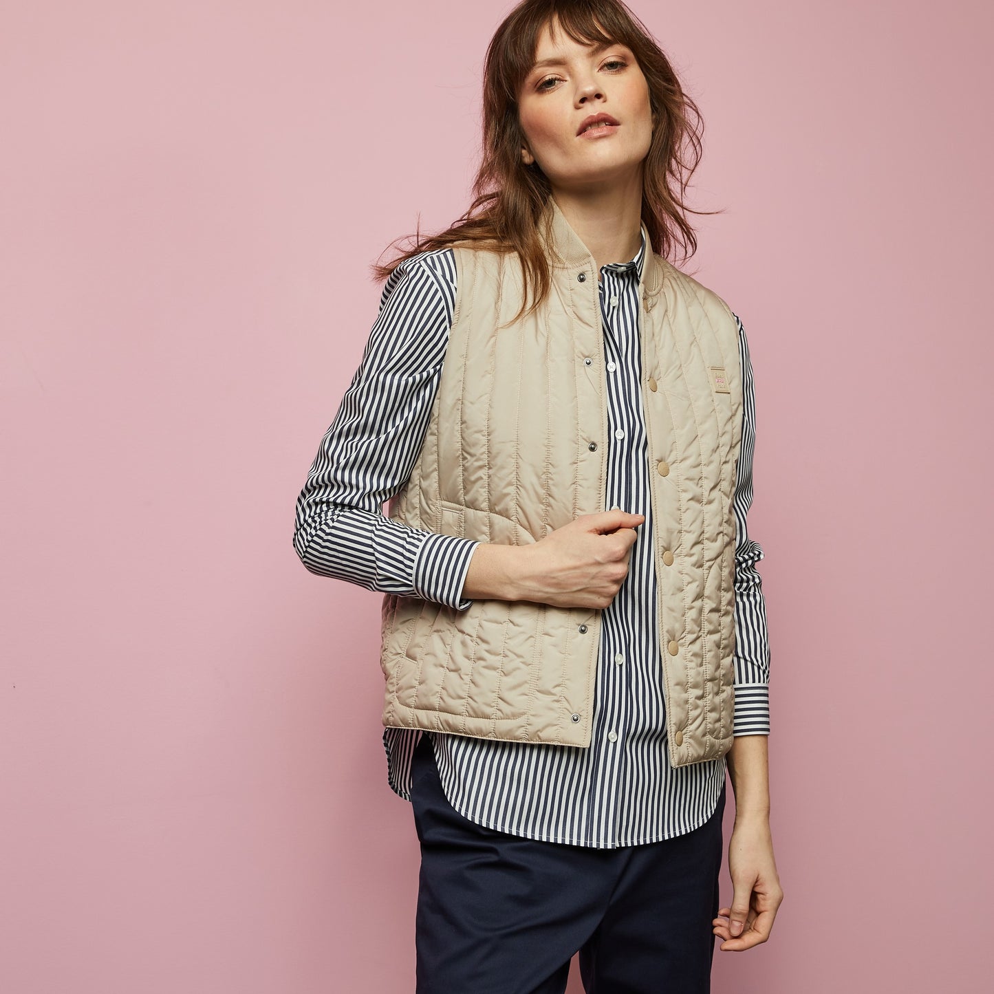 Beige sleeveless puffa jacket