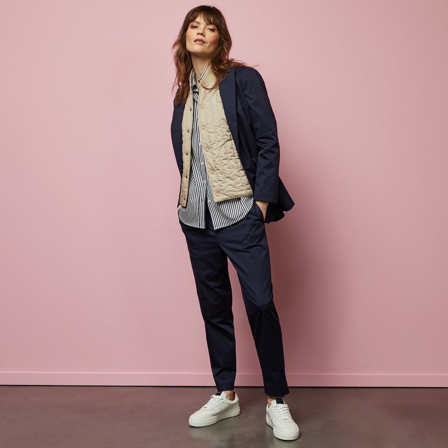 Beige sleeveless puffa jacket