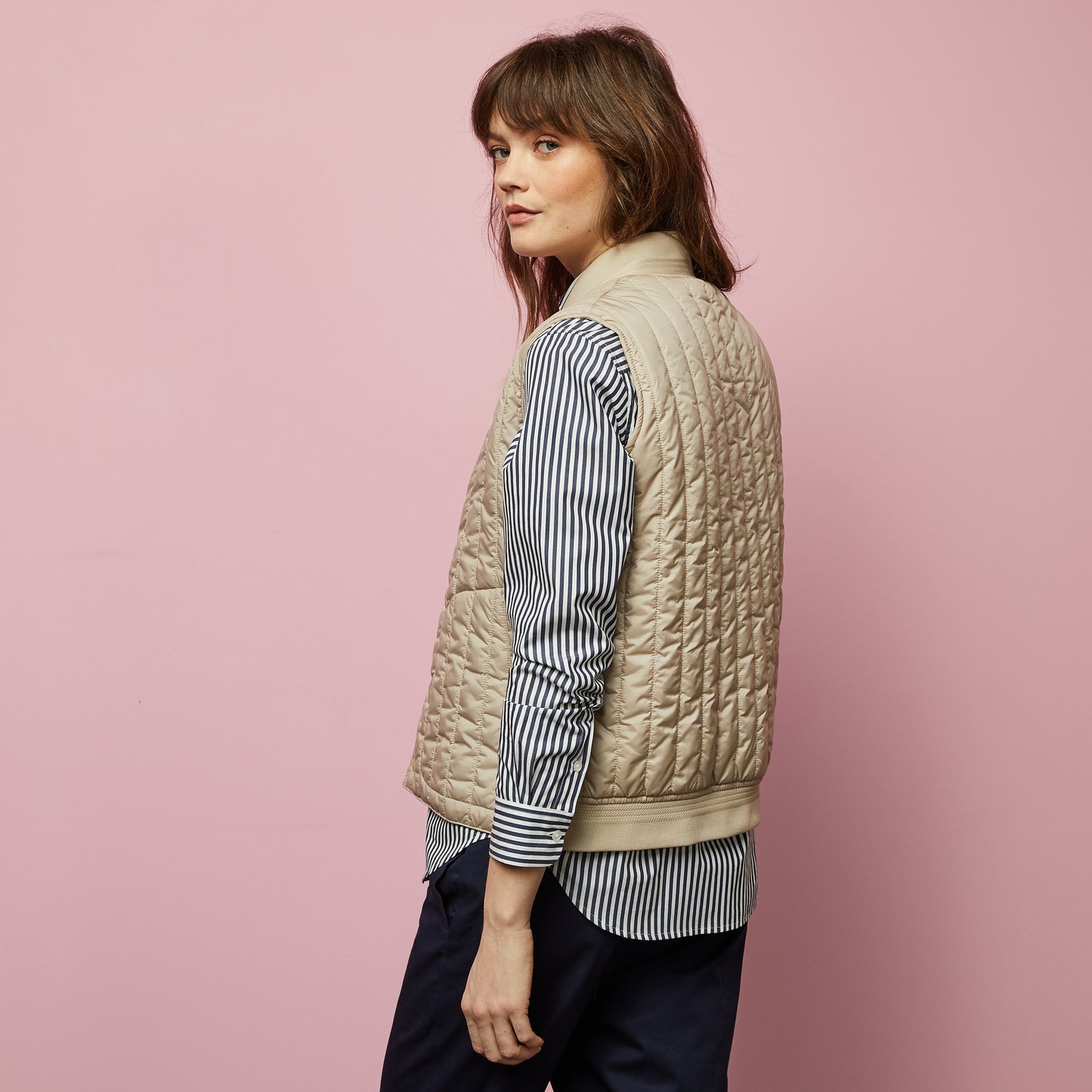 Beige sleeveless puffa jacket